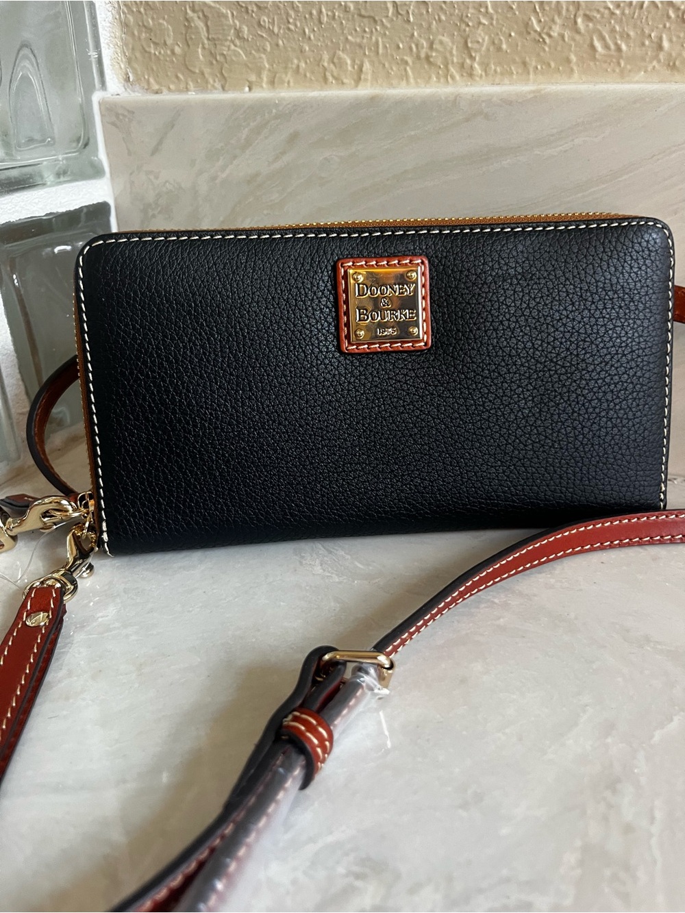 Dooney & Bourke Black Pebble Leather Wristlet with Brown Trim